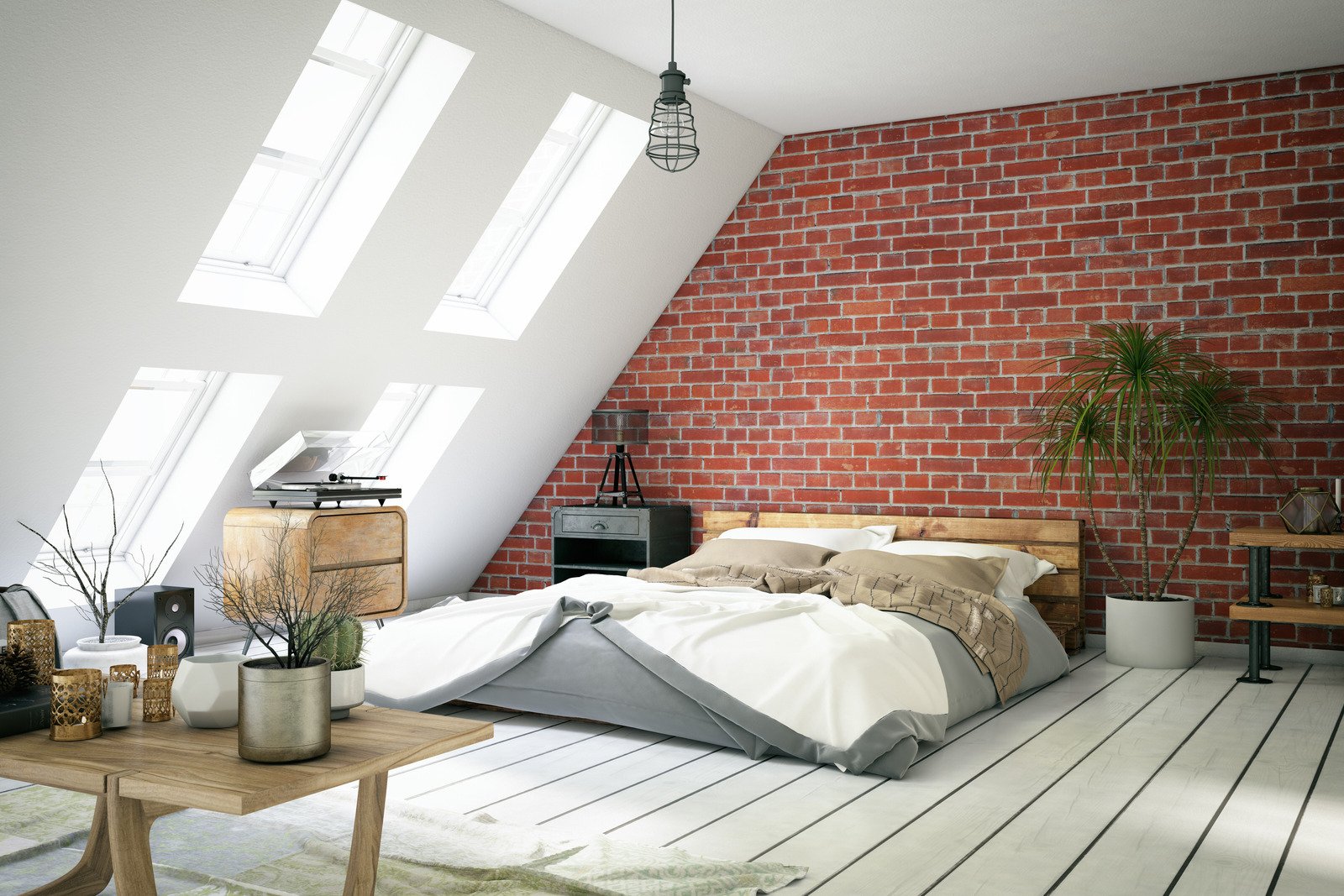 kanapa, łóżko i ceglana ściana